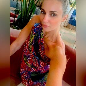 B fyne wrap. I turned it into a shirt. It can also be a sarong or ss cover up